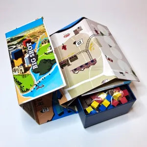 Big Shot arranged for play with cubes and money ready for auction.