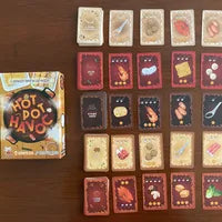 All components of Hotpot Havoc, including ingredient cards and sauce tokens.
