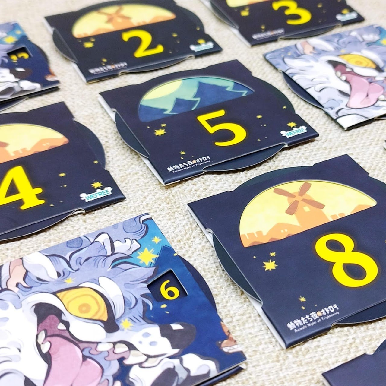 Group of players engaging in Animals Frightening Night! with bluffing and deduction at the table.