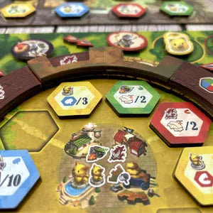 Players stacking tiles and defending castles in Castle Raisers, the strategic fairy tale game from Taiwan.