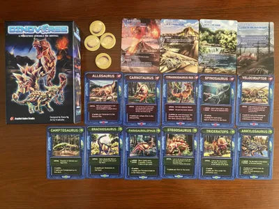 Components of Dinoverse, including dinosaur cards and Herd board.