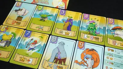 Players revealing and battling with creature cards in Forest Gangs, the quick fantasy card game.