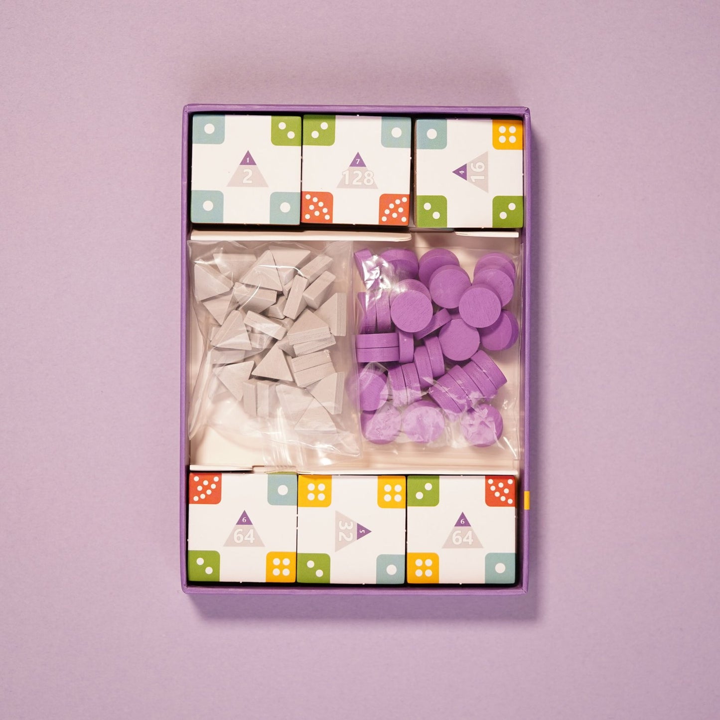 All Heureka components including symbol tiles, tokens, and score markers.