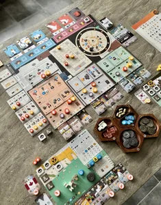 All components of Manhattan Project: Energy Empire, including game board, worker tokens, energy dice, structures, and expansion content.