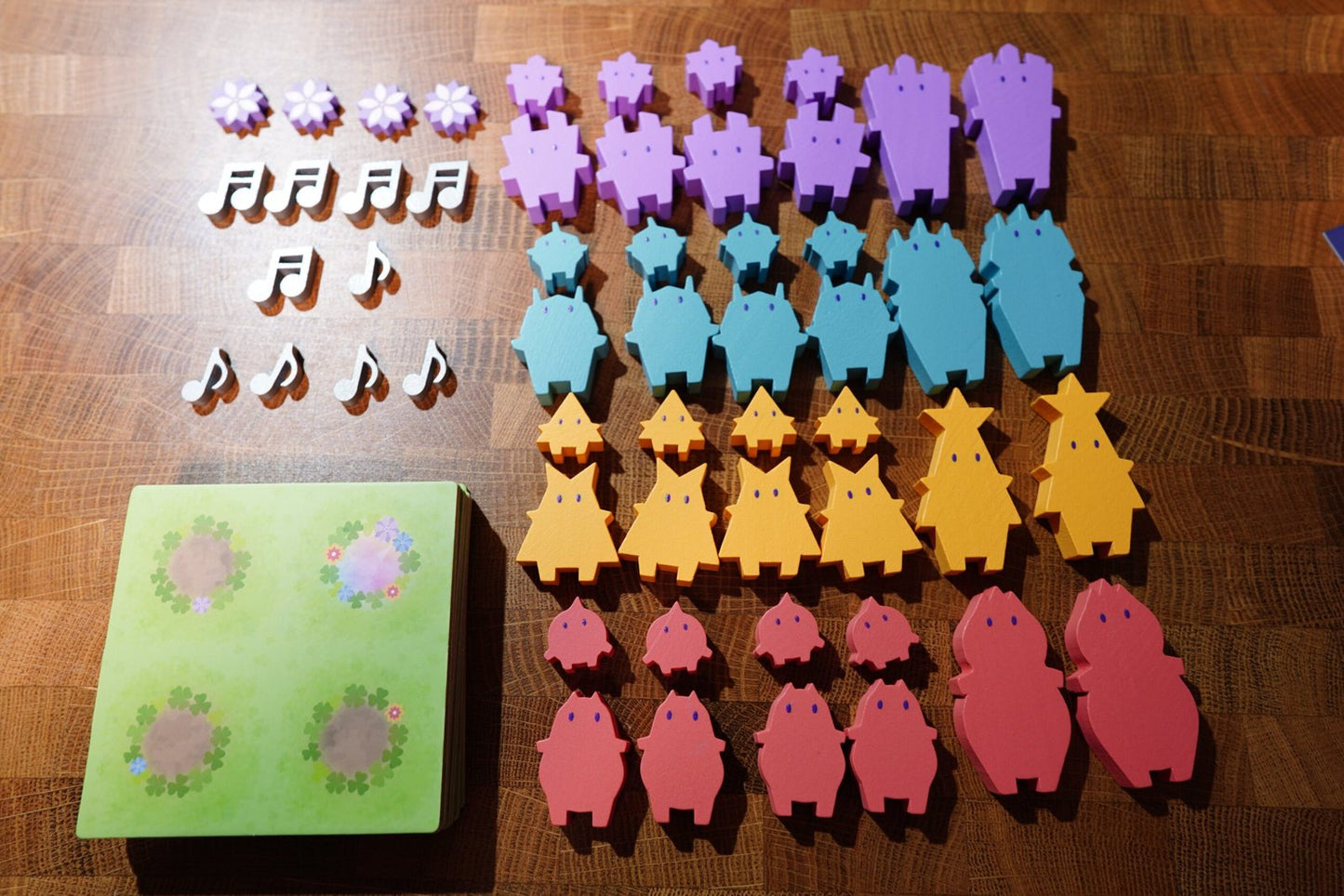 All PalinGnomes components including gnome pieces, scoring markers, and board.
