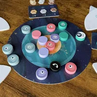 Open Planeptia box with magnetic board, discs, and rulebook displayed.