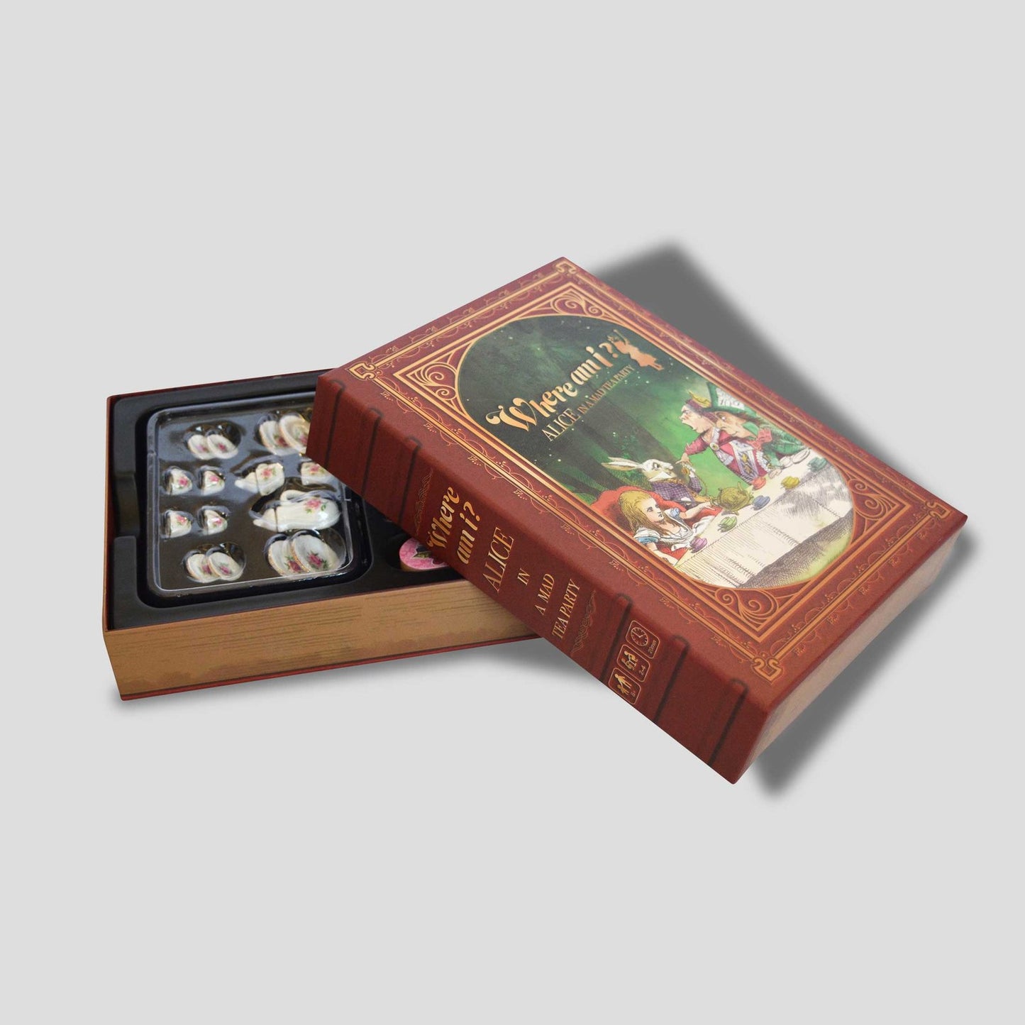 Alice in a Mad Tea Party box opened slightly with lid up