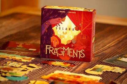 Fragments: Solara — box with puzzle pieces on the table